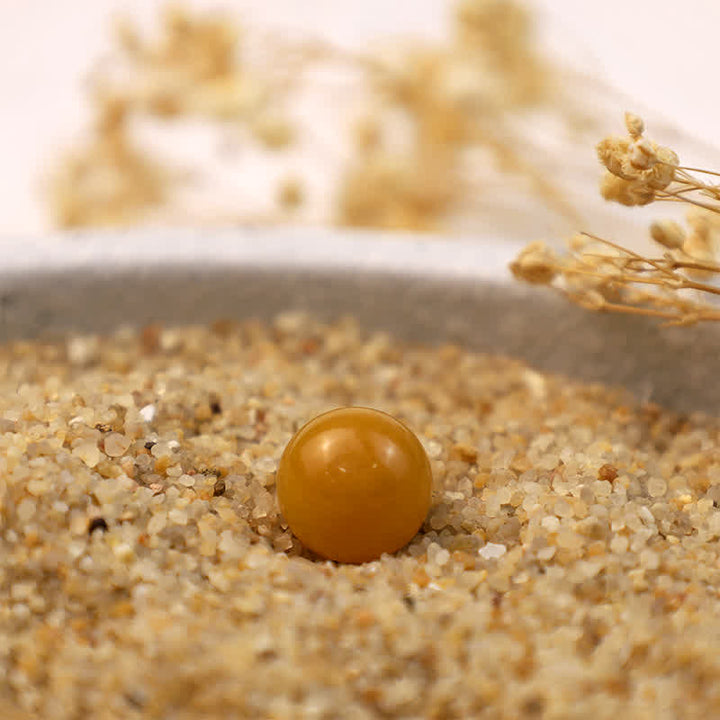 Sfera di cristallo positivo di giada gialla Olivenorma