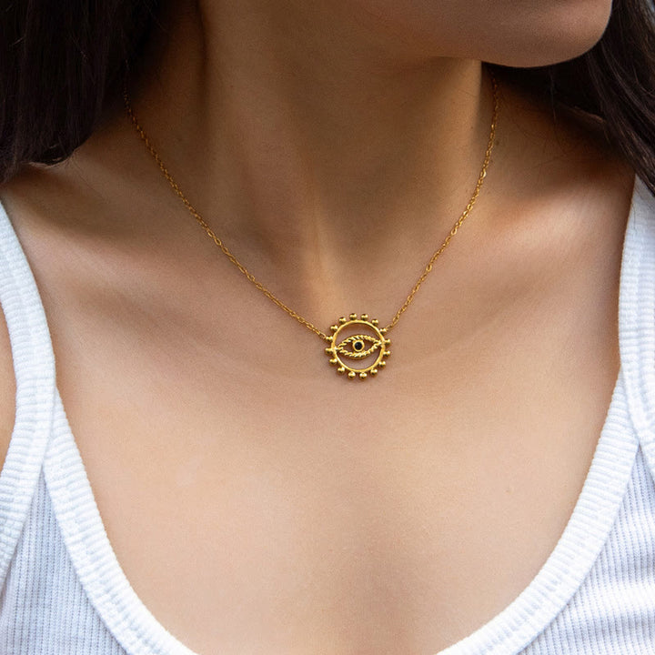 Collana in acciaio inossidabile placcato oro 18K con ciondolo a forma di occhio malvagio rotondo cavo Olivenorma 