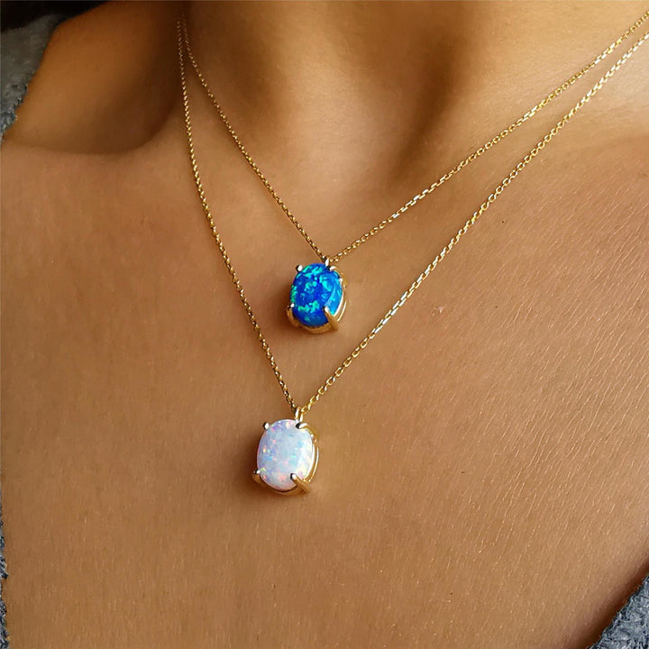 Collana Olivenorma in rame placcato oro 18k con opale bianco blu