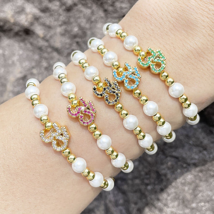 Bracciale Olivenorma in ottone con perle e simbolo Om