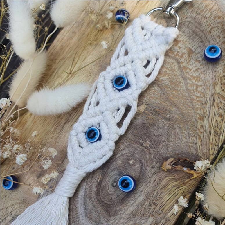 Olivenorma Ornamento con nappa in cotone colorato intrecciato a mano bohémien con occhio maligno