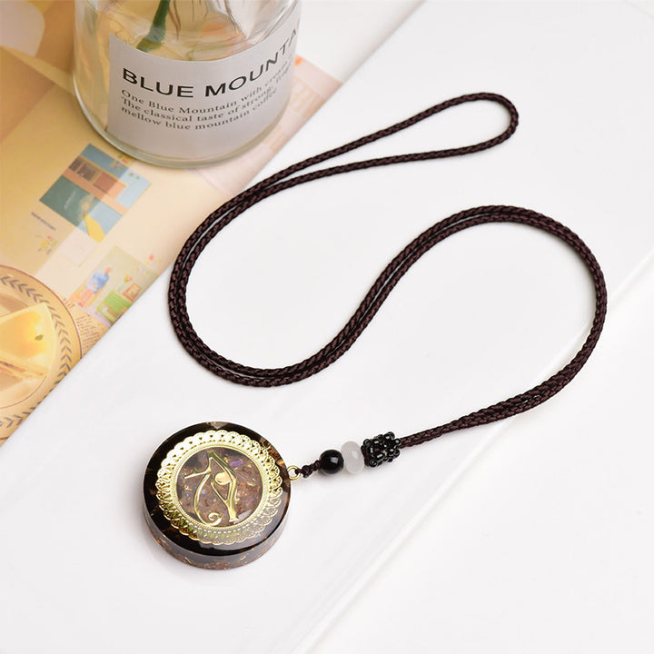 Collana con simbolo dell'occhio di Horus in ossidiana e agata rossa Olivenorma