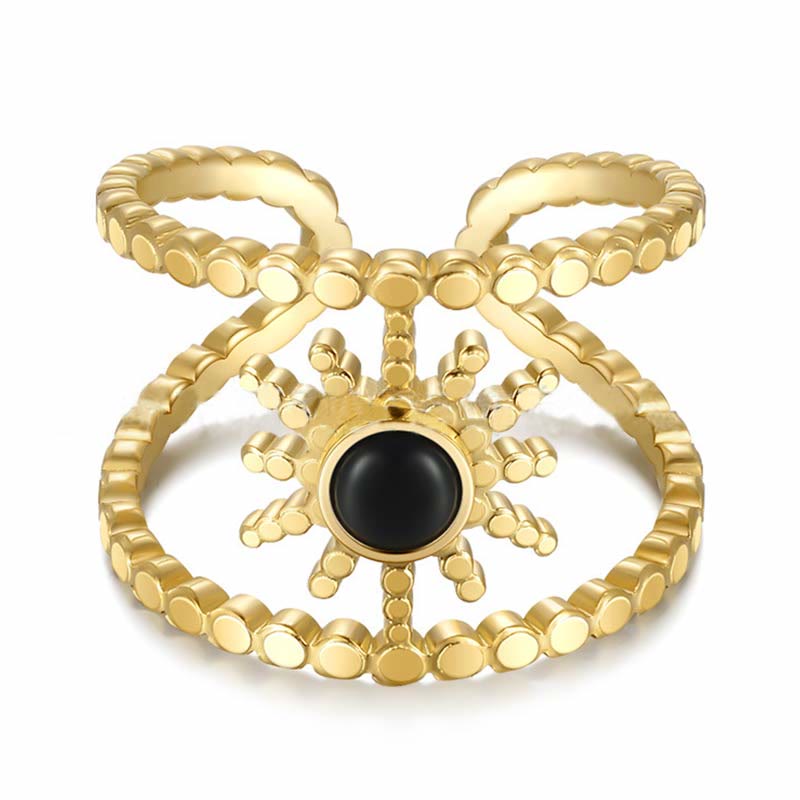Anello con gemma a forma di stella a otto punte e doppia fila di girasole Olivenorma