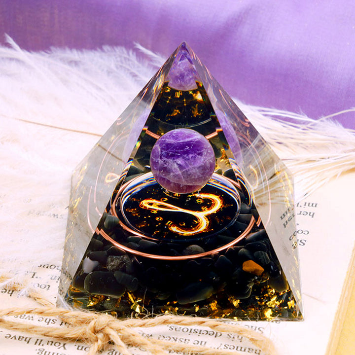 Sfera di ametista Olivenorma con piramide di orgone dello zodiaco Ariete in ossidiana 