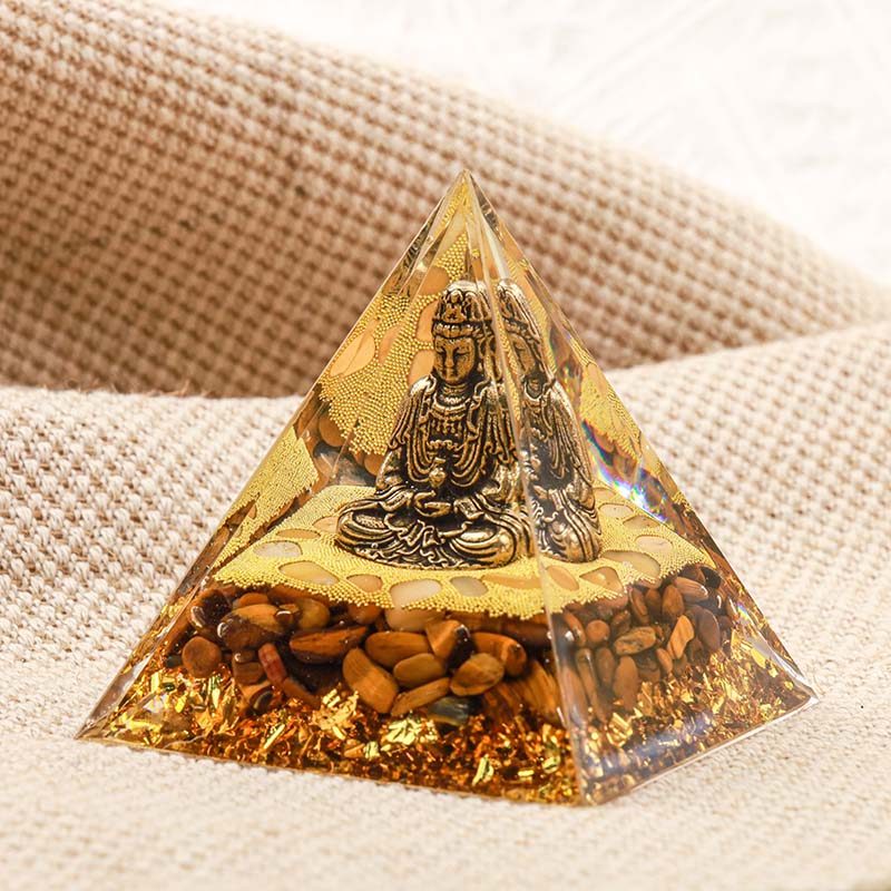 Buddha Olivenorma con piramide di orgone con protezione dell'occhio di tigre
