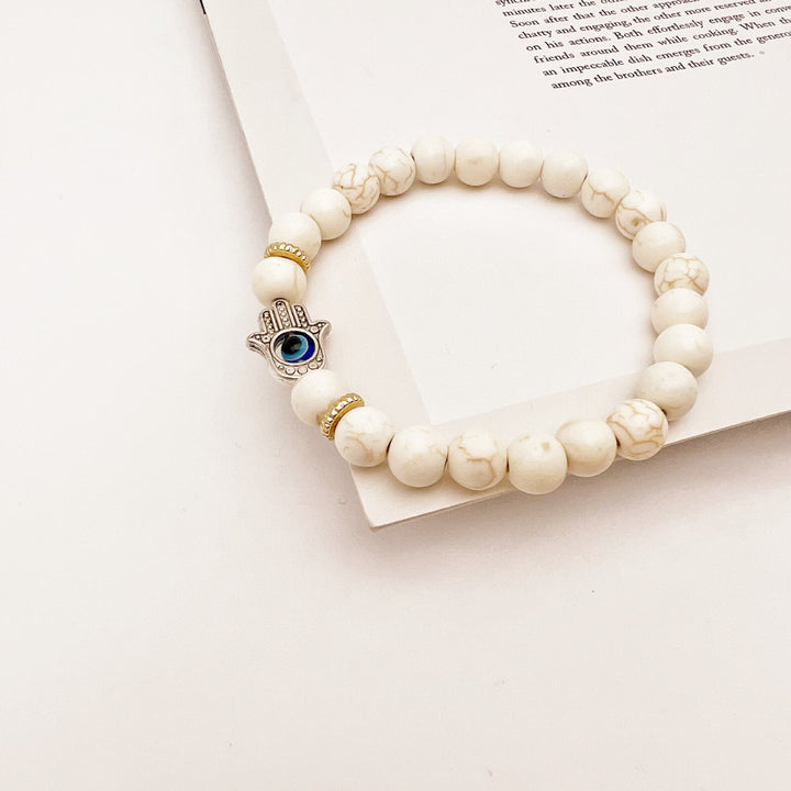Braccialetto elastico con perline in pietra naturale anti-malocchio Olivenorma