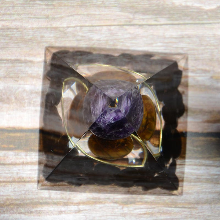 Sfera di ametista Olivenorma con piramide di orgone in ossidiana occhio di tigre 