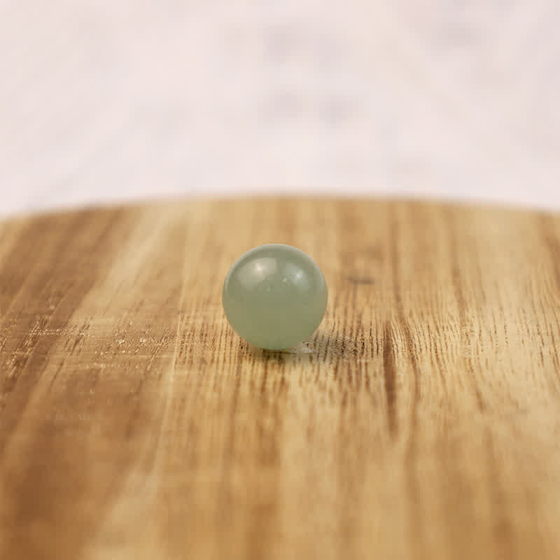 Sfera di cristallo della prosperità in avventurina verde Olivenorma