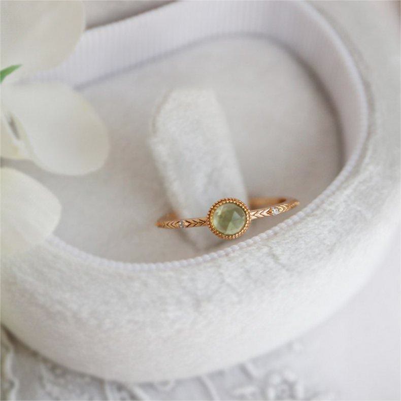 Anello Olivenorma con peridoto verde taglio rotondo naturale