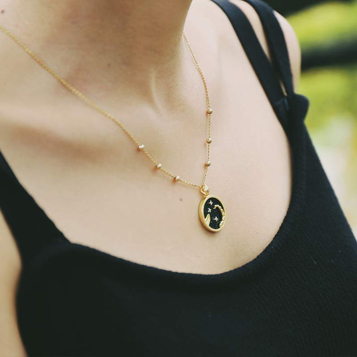 Collana Zodiaco in ascolto in arenaria blu 