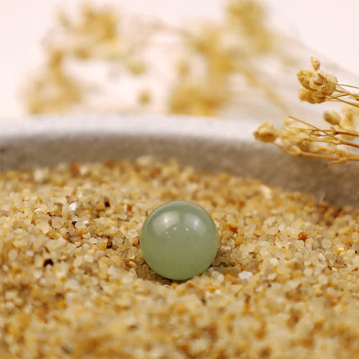 Sfera di cristallo della prosperità in avventurina verde Olivenorma