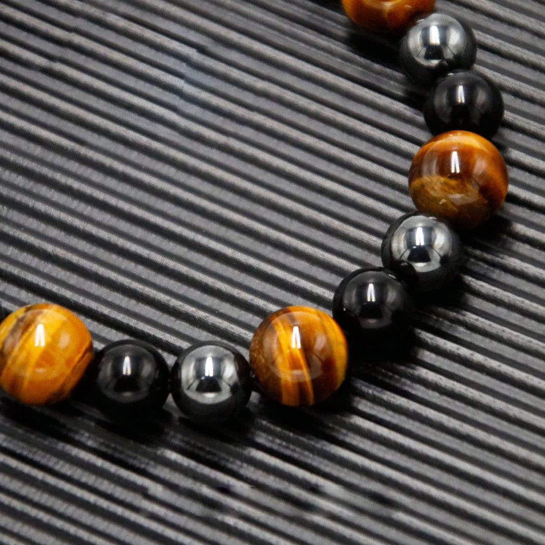 Collana di perle di ematite, occhio di tigre, ossidiana e cristallo curativo Olivenorma