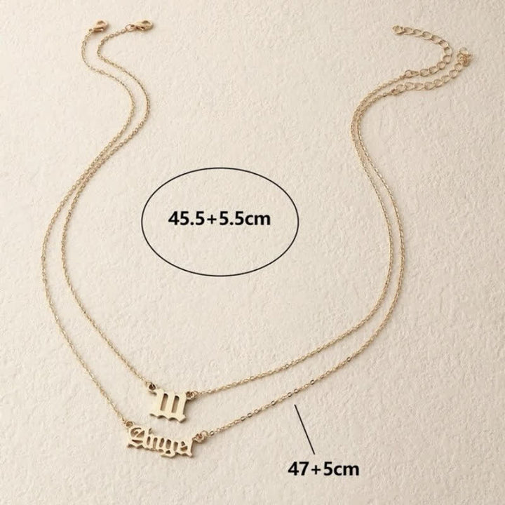 Collana doppia delicata con numero angolare e angelo Olivenorma 