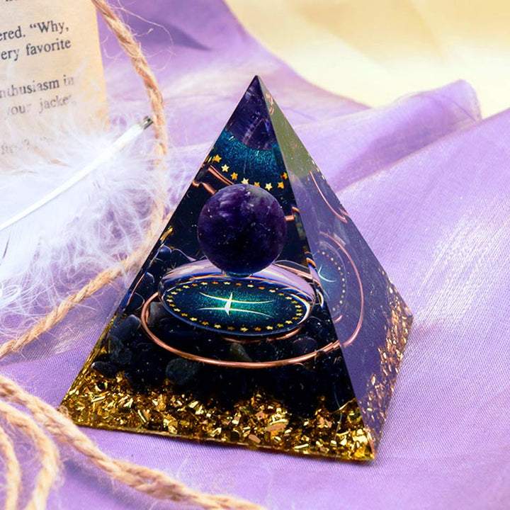 Sfera di ametista Olivenorma con piramide di orgone in ossidiana Zodiaco Pesci 
