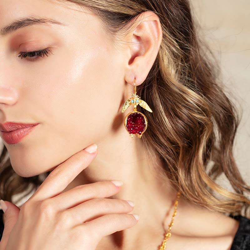 Olivenorma Orecchini alla moda con semi di melograno portafortuna