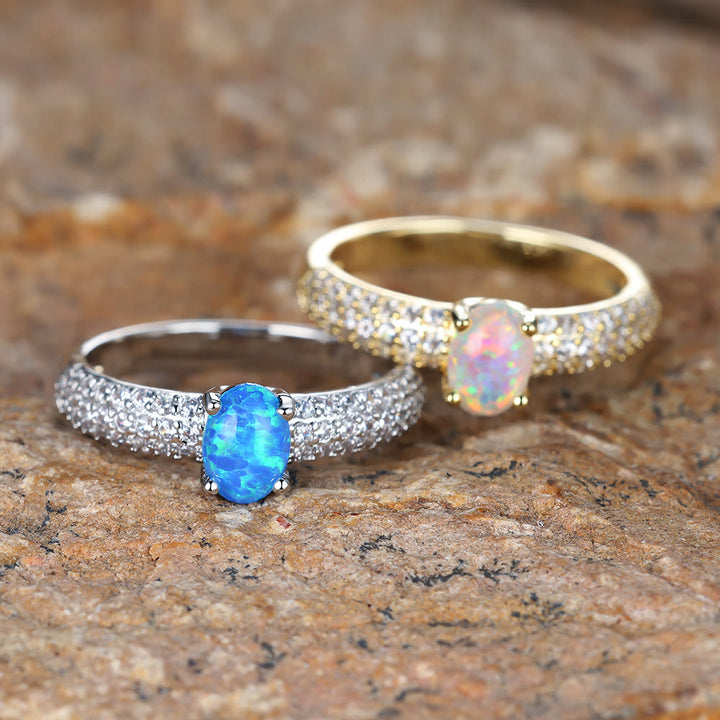 Anello Olivenorma "Shiny Elegance" con fascia in zircone e opale rotondo