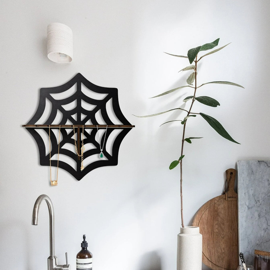 Portacandele in legno espositivo Olivenorma Spider con ripiano in cristallo