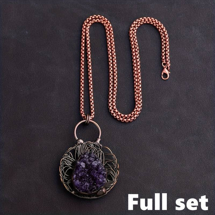 Collana Olivenorma con pietra preziosa di ametista irregolare intarsiata e filo avvolto