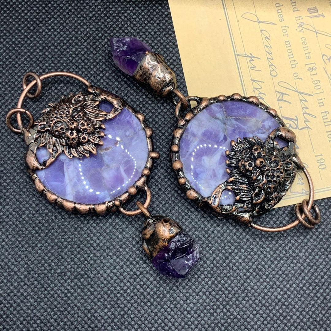 Collana Olivenorma con testa di bue in rame e pietra preziosa di quarzo trasparente