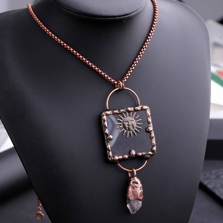 Collana con pietra preziosa irregolare in agata nera e ametista del dio del sole Olivenorma