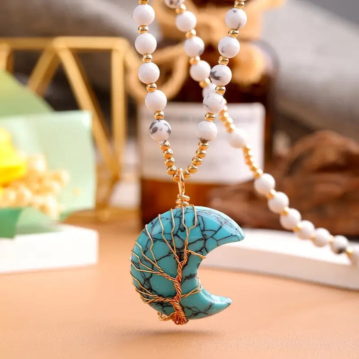 Collana con perle di cristallo a forma di luna e albero della vita Olivenorma