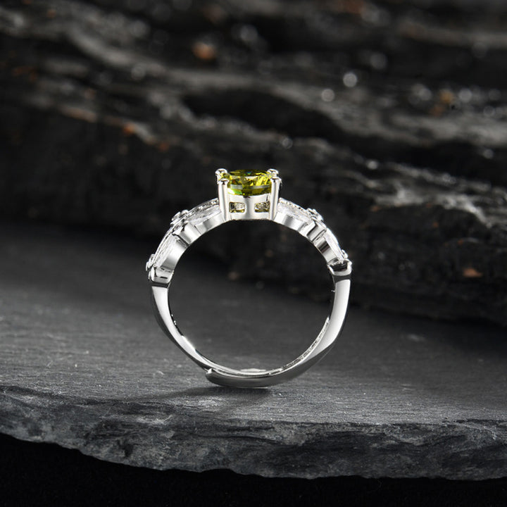 Olivenorma "The Jungle Angel" - Anello in peridoto da un carato con quattro artigli