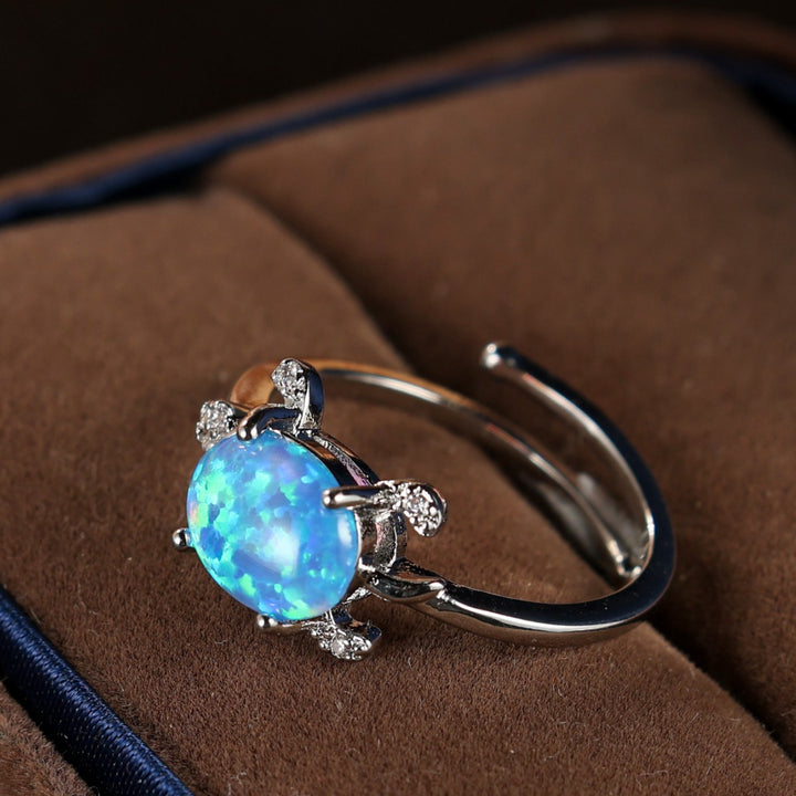 Olivenorma Anello con tartaruga marina carina e blu opale 