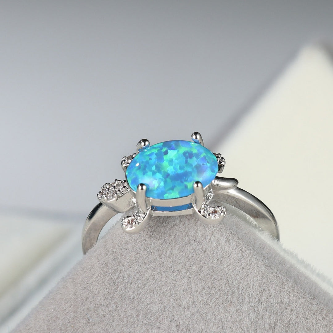 Olivenorma Anello con tartaruga marina carina e blu opale 
