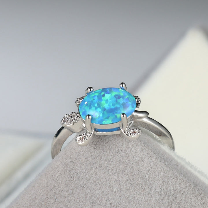 Olivenorma Anello con tartaruga marina carina e blu opale 