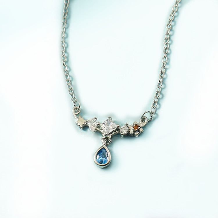 Collana di ispirazione vintage con ciondolo in zircone blu Olivenorma e elemento a stella - image 8
