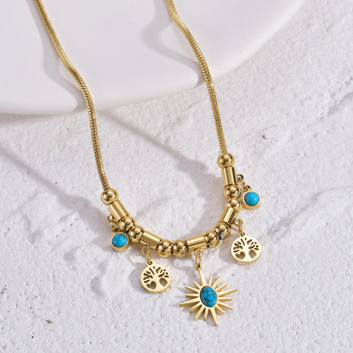 Collana con ciondolo a forma di stella turchese con albero della vita Olivenorma