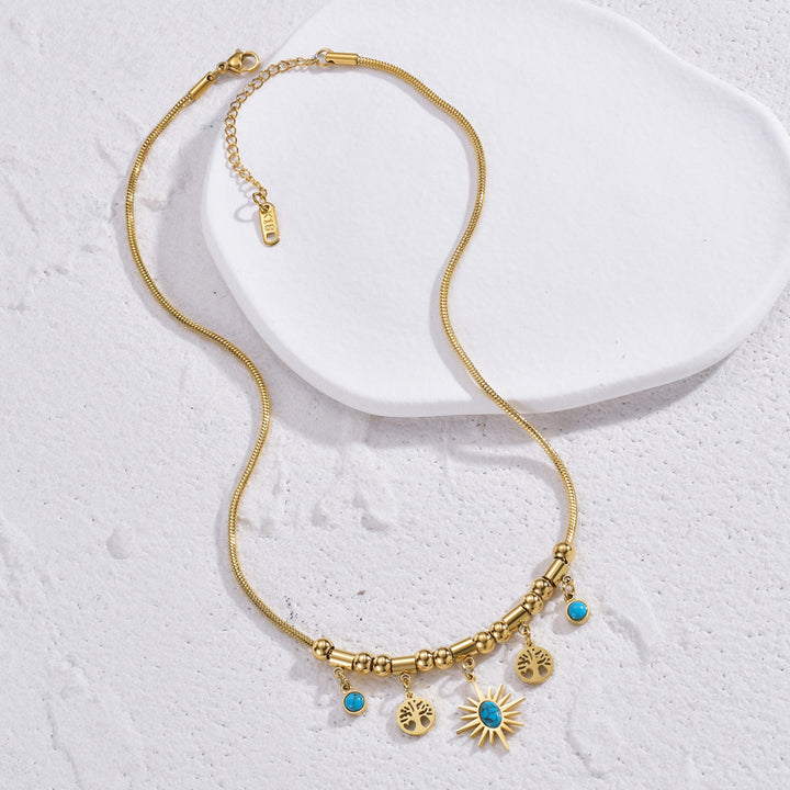 Collana con ciondolo a forma di stella turchese con albero della vita Olivenorma