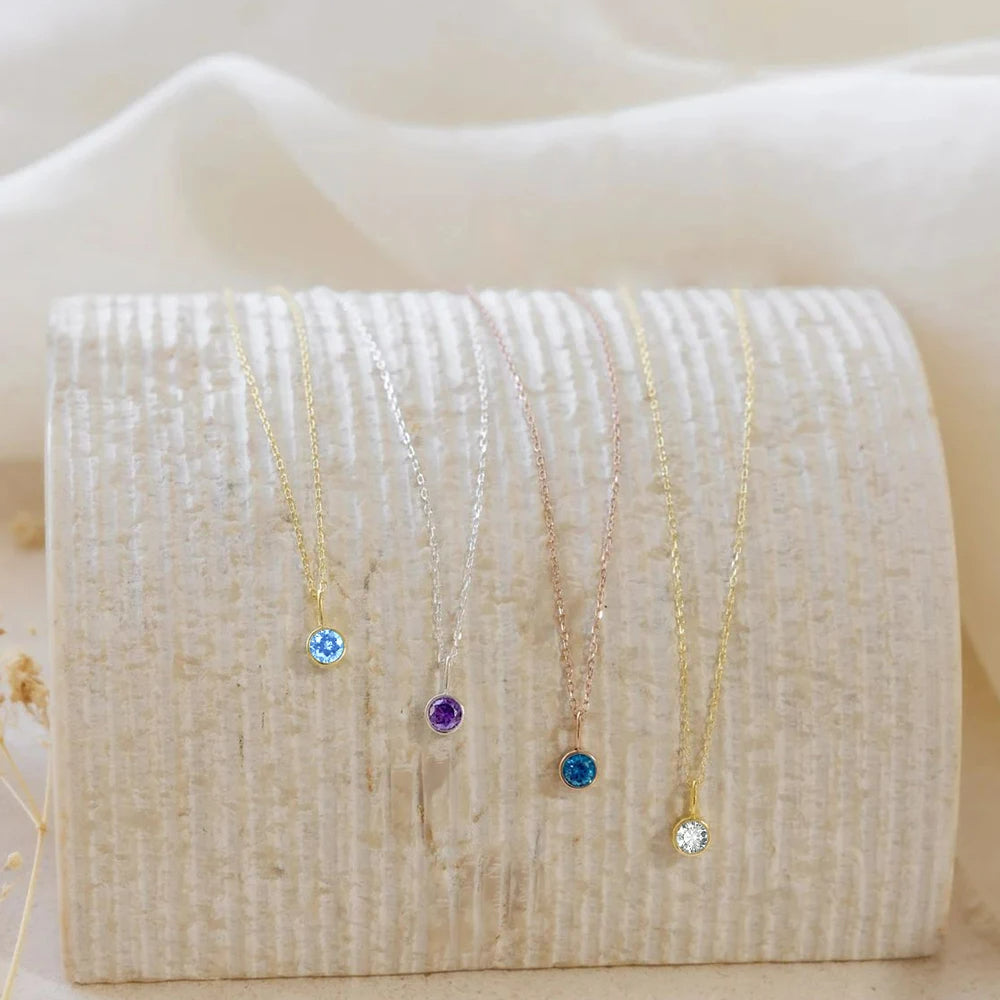 Collana con ciondolo con pietra portafortuna da 8 mm della costellazione Olivenorma