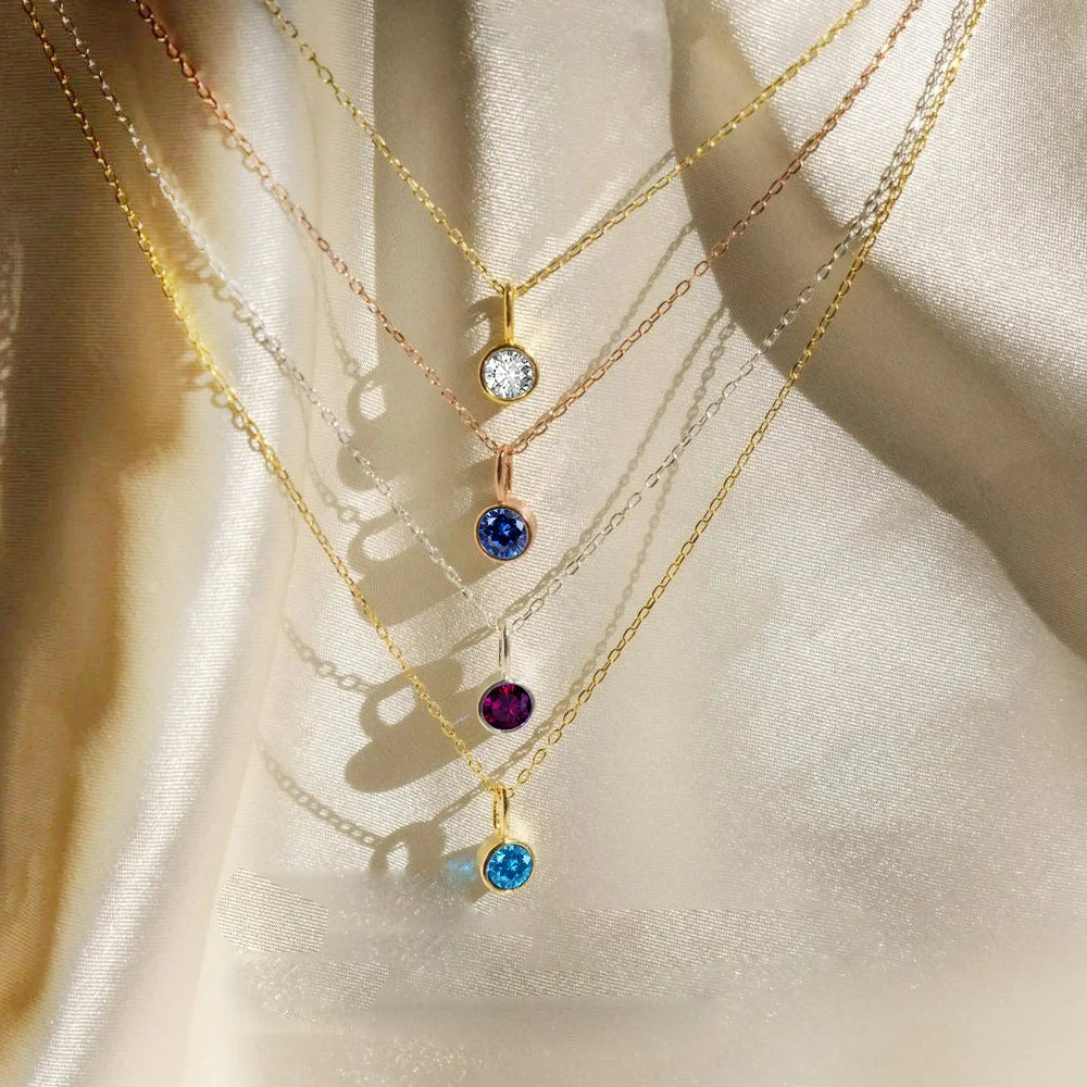 Collana con ciondolo con pietra portafortuna da 8 mm della costellazione Olivenorma