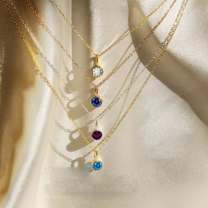 Collana con ciondolo con pietra portafortuna da 8 mm della costellazione Olivenorma