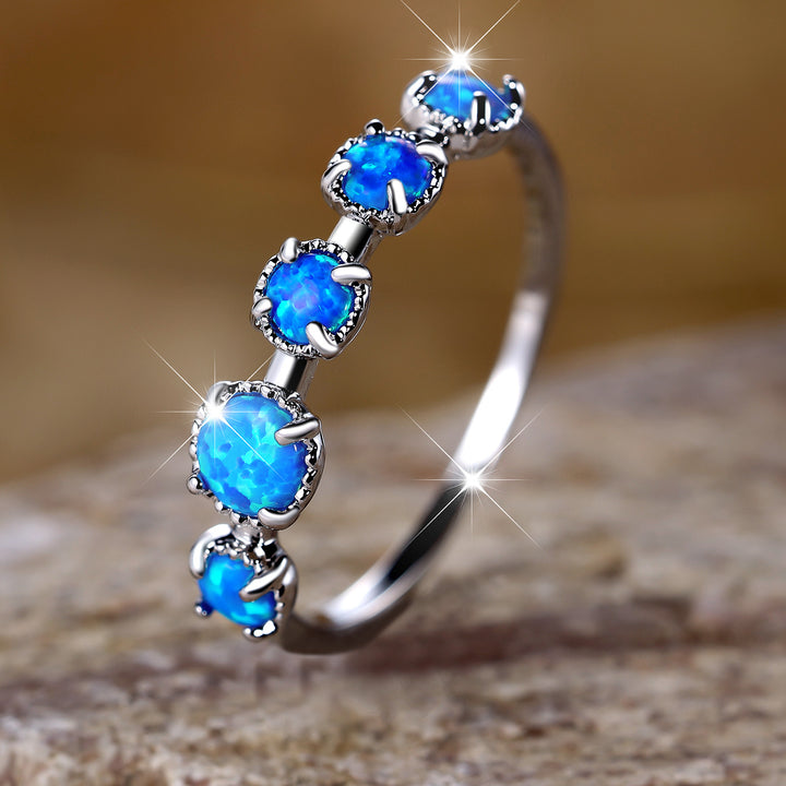 Anello Olivenorma Cinque Opali Blu Bianco Semplici Disegni