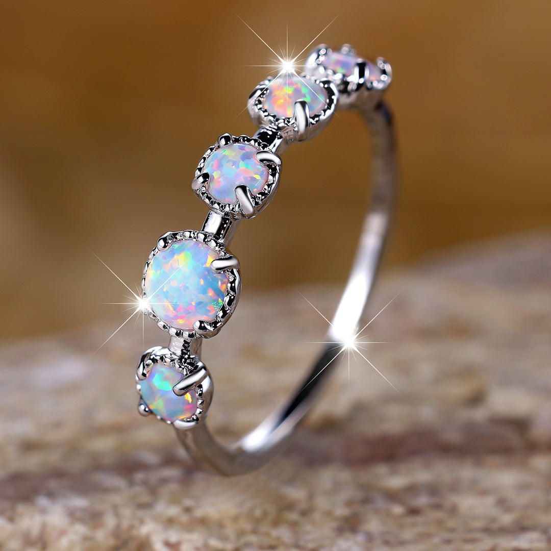 Anello Olivenorma Cinque Opali Blu Bianco Semplici Disegni