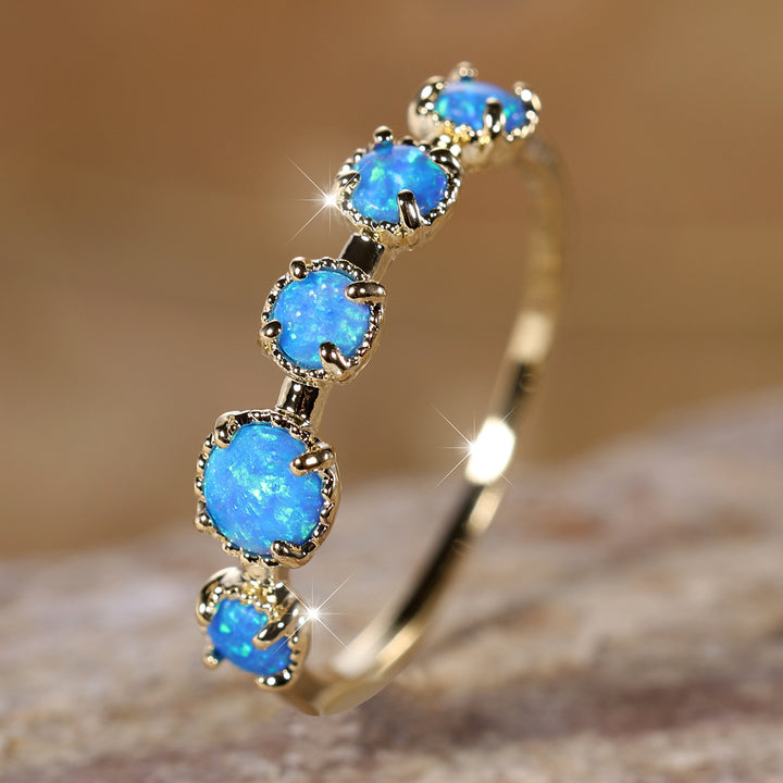 Anello Olivenorma Cinque Opali Blu Bianco Semplici Disegni