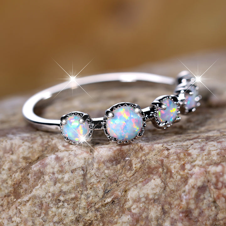 Anello Olivenorma Cinque Opali Blu Bianco Semplici Disegni