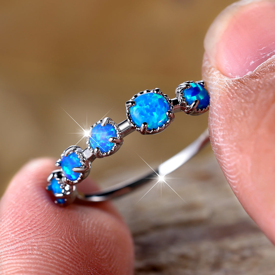 Anello Olivenorma Cinque Opali Blu Bianco Semplici Disegni