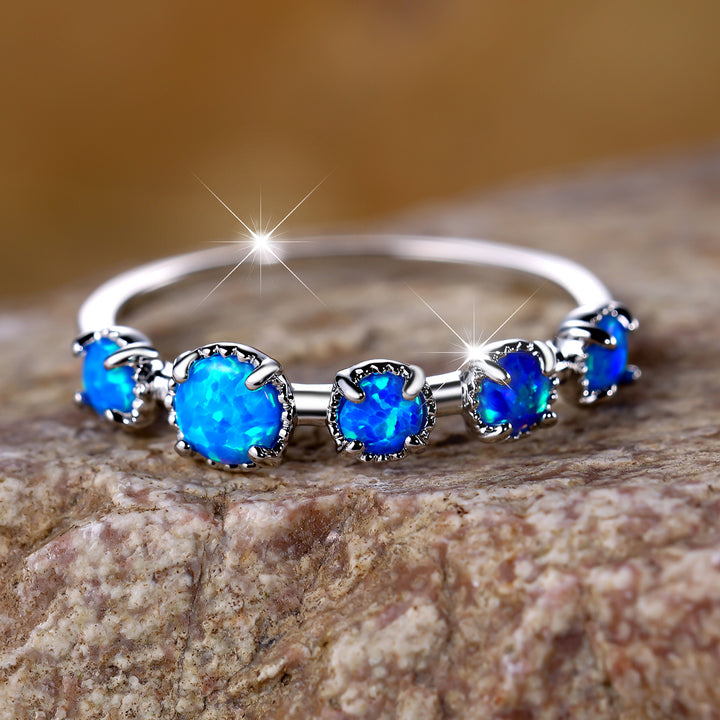 Anello Olivenorma Cinque Opali Blu Bianco Semplici Disegni
