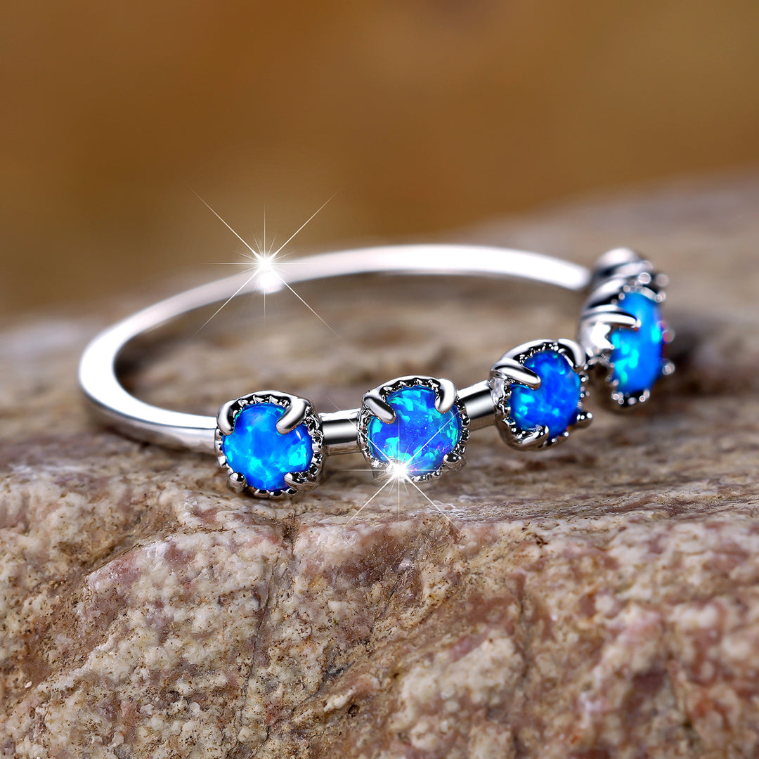 Anello Olivenorma Cinque Opali Blu Bianco Semplici Disegni