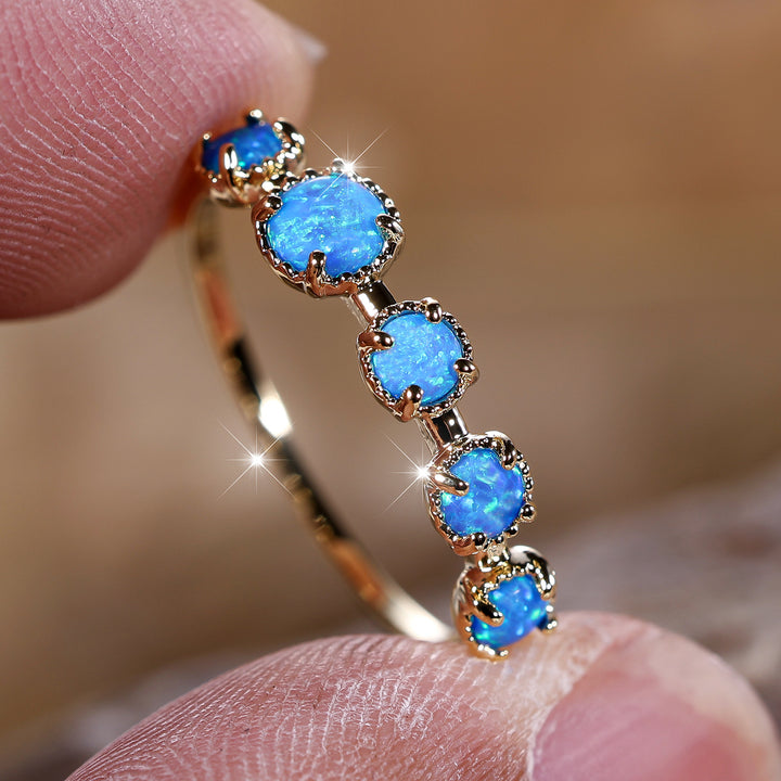 Anello Olivenorma Cinque Opali Blu Bianco Semplici Disegni