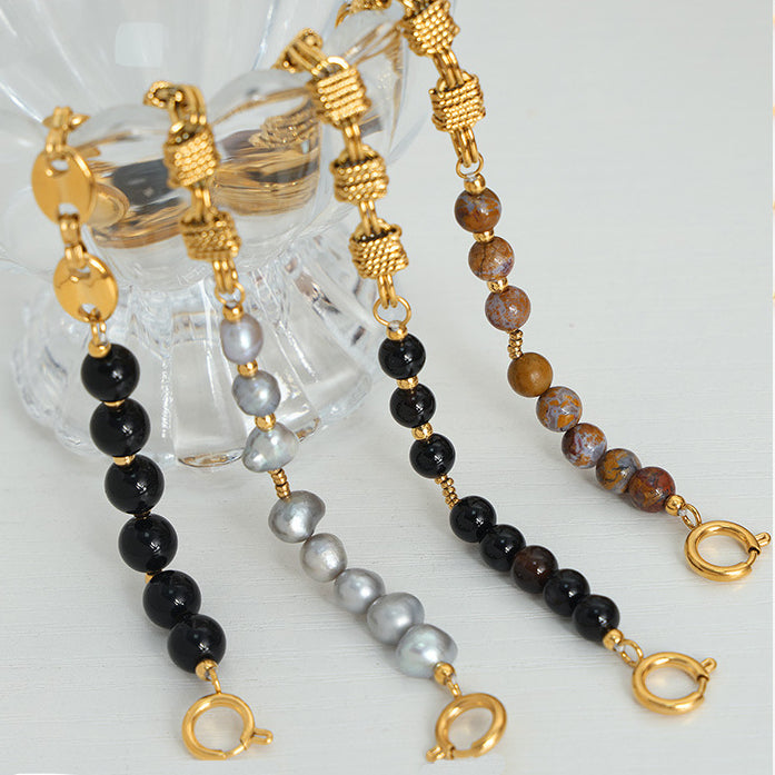 Bracciale Olivenorma in acciaio al titanio con perline di agata nera e onice 