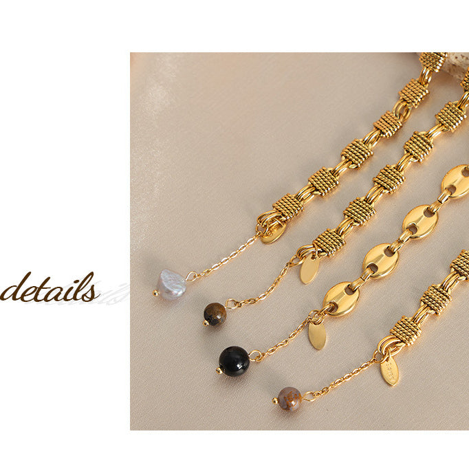 Bracciale Olivenorma in acciaio al titanio con perline di agata nera e onice 