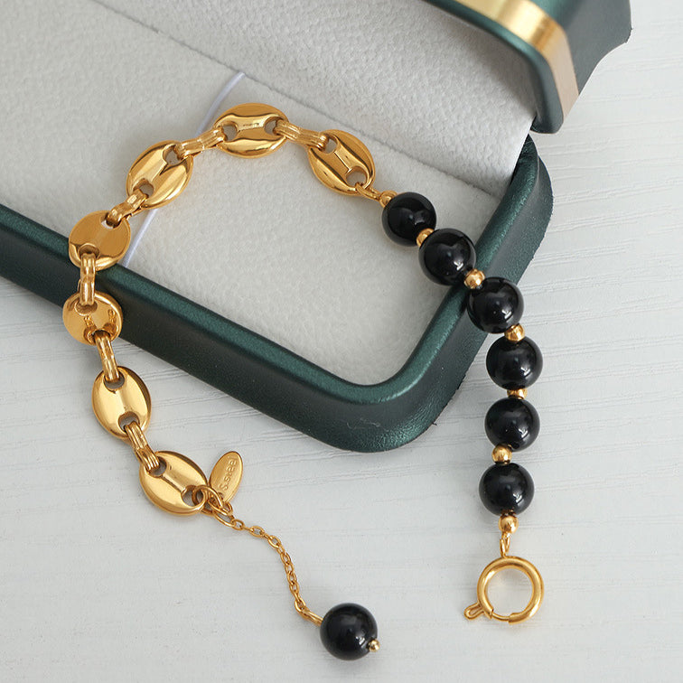 Bracciale Olivenorma in acciaio al titanio con perline di agata nera e onice 