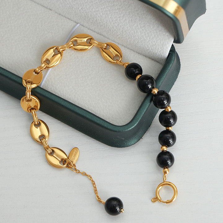 Bracciale Olivenorma in acciaio al titanio con perline di agata nera e onice 