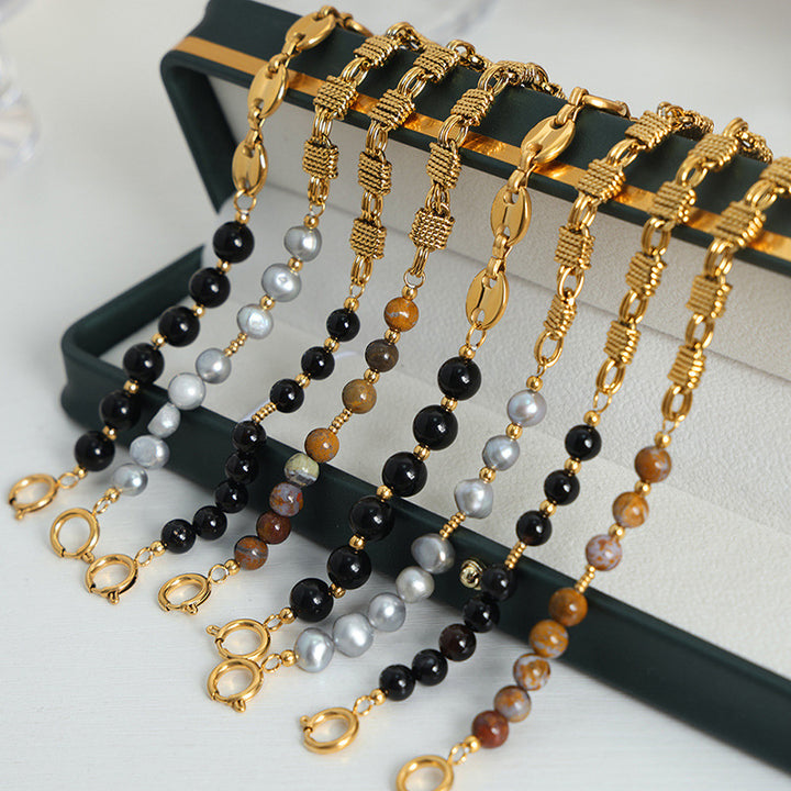 Bracciale Olivenorma in acciaio al titanio con perline di agata nera e onice 