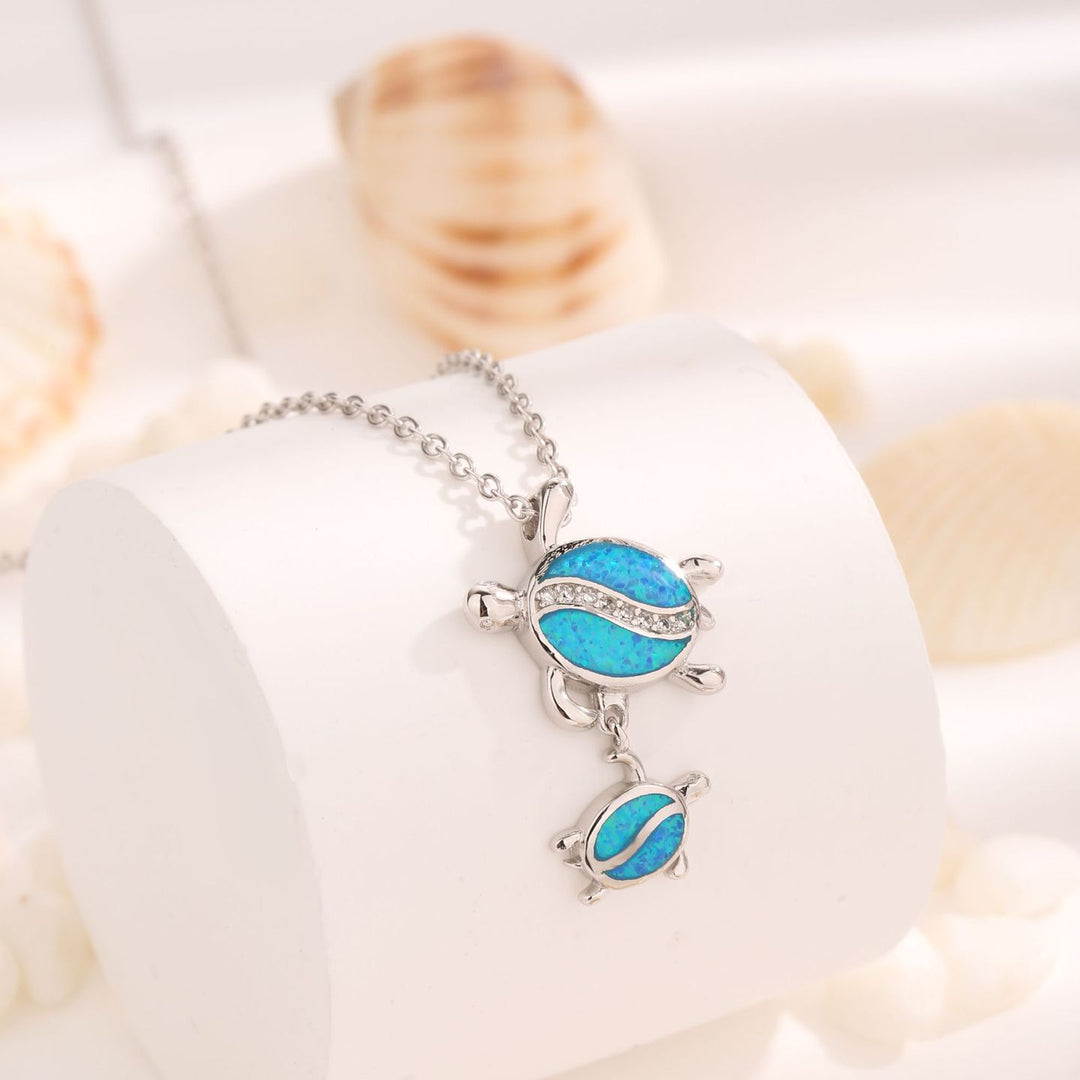 Collana con ciondolo a doppia tartaruga in opale blu Olivenorma