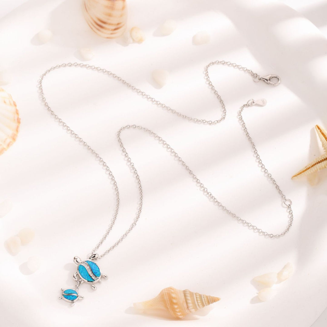 Collana con ciondolo a doppia tartaruga in opale blu Olivenorma